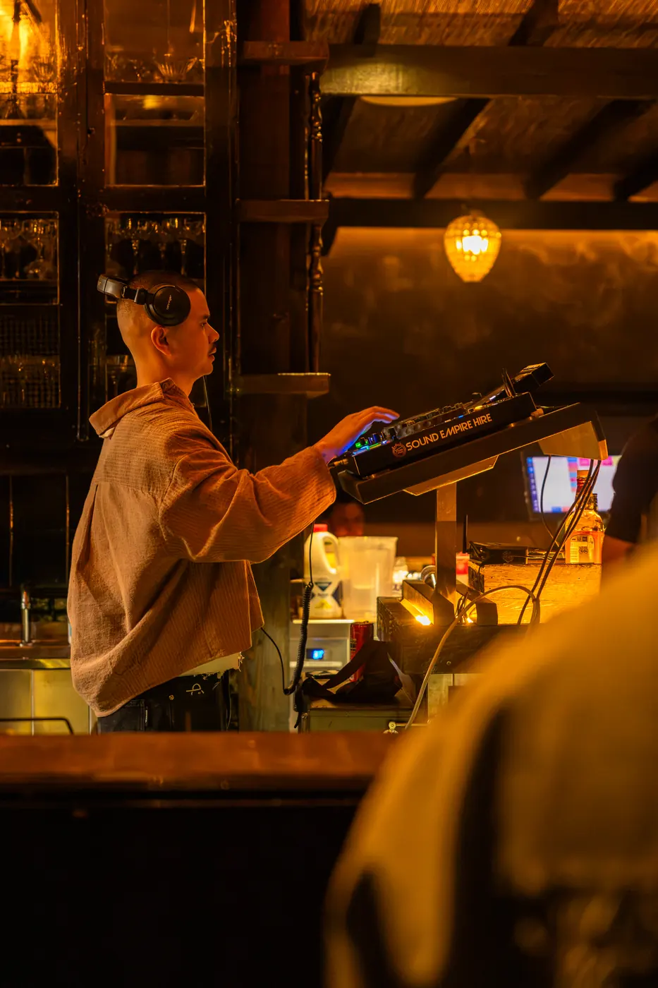 A DJ playing in the Soi Fire dining room